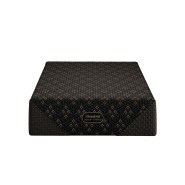 Close-up of a Beautyrest Black Hybrid mattress with patterned surface.