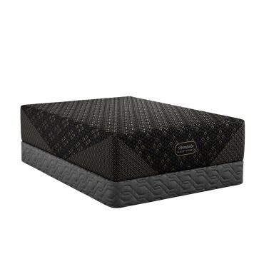 Black hybrid Beautyrest mattress on a gray base.