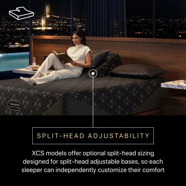 Woman reading on a bed with split-head adjustability.
