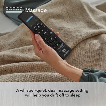 a person holding the remote to the Platinum