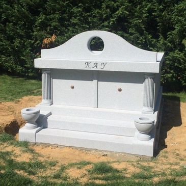 Gray garden crypt mausoleum for two people