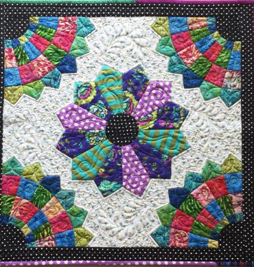 Wedges Rule quilt made by free motion and traditional quilting teacher Joy Clark