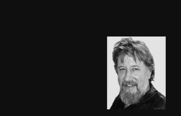 Director Sasha d'Or, framed in B&W