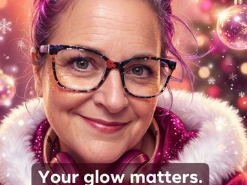 Close-up of a smiling woman with glasses and festive background.
