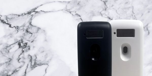 Air Flow Aerosol Dispensers (Mini) on white marble background (white and black)