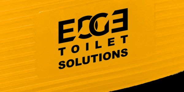 EDGE Toilet Clip Plus mango fragrance with yellow colour zoomed in and showing EDGE Toilet Solutions