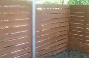 Horizontal wood privacy fence is a growing trend among Austin homeowners.
