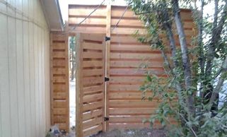 Ten foot tall horizontal shadow box privacy fence in Austin Texas. The ultimate wood fence