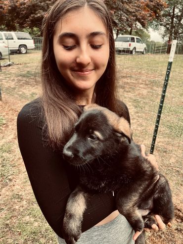 Our daughter Alex on our first day with Conan at 8 weeks old.