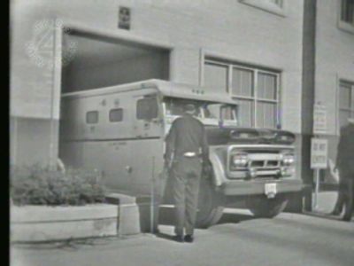 Armored car at garage entrance moments before Jack Ruby's arrival.