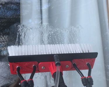 Water fed pole brush