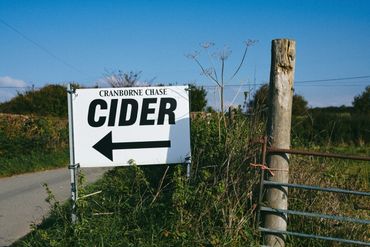 Entrance location Rustic Stays glamping holidays shepherds huts showing Cranborne Chase Cider sign