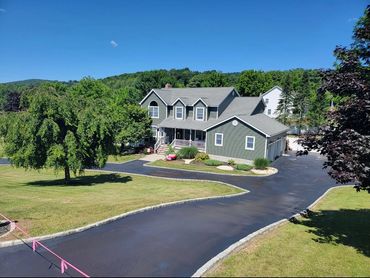 a finished driveway seal coated with neatness