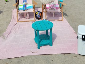 Luxury cabana setup with beach chairs and inflatables for rent in Juno Beach.