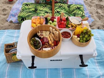 Beach cabana and chair rental near me with umbrellas in West Palm Beach. Charcuterie board!
