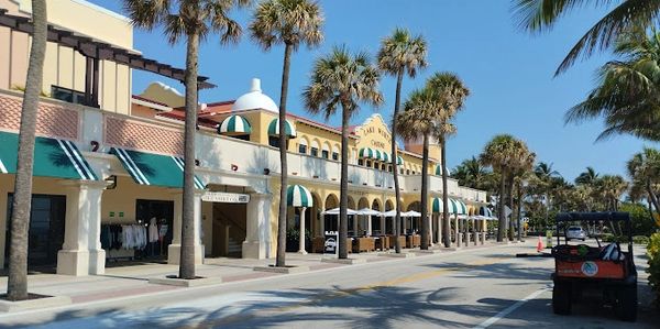 Cabanas and beach chairs set up near Lake Worth Casino for a relaxing day. Beach chair rental nearme