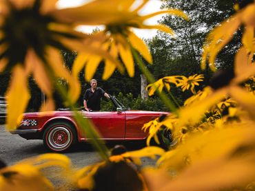 Triumphs are red flowers are yellow great family photos with this fine fellow