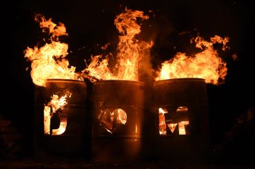The wedding venue was lit! by barrel fires. Great vibe especially with initials cut into them.