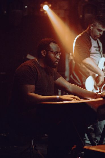 Concert performance photograph in London.