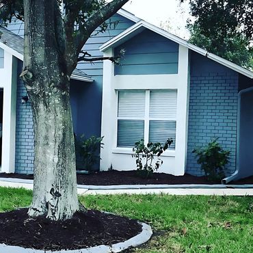House painted blue with white trim