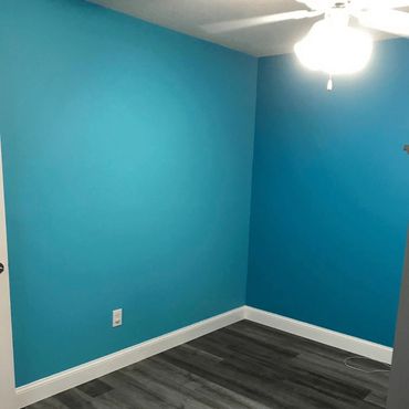 Beautiful blue wall with white trim