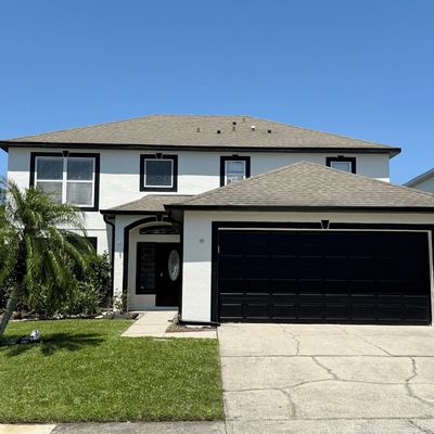 House painted with with dark trim