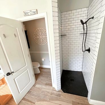 Remodeled bathroom with new shower and floor