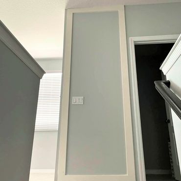 Gray wall with beige trim