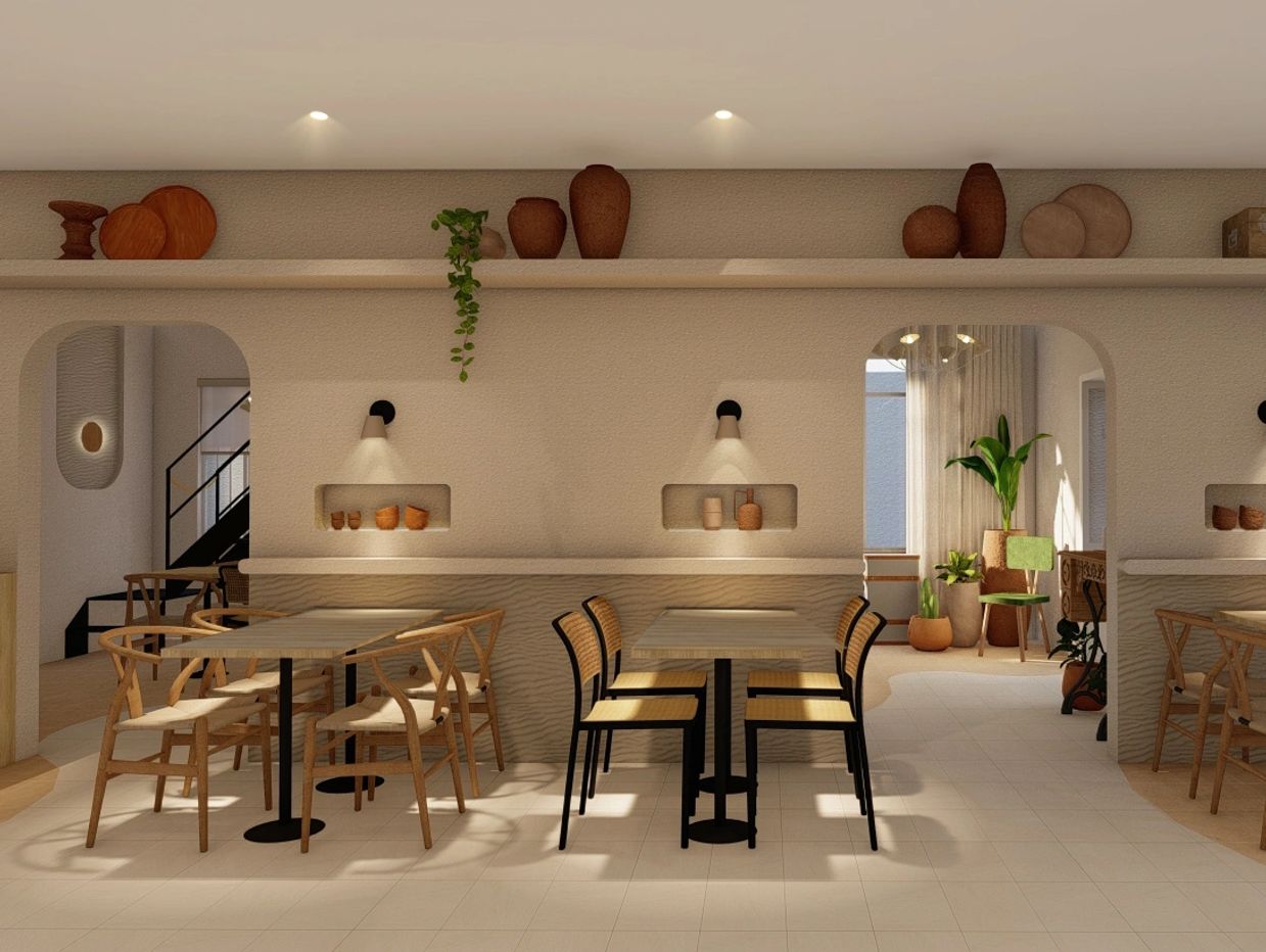 Modern dining area with wooden chairs and warm decorative elements.