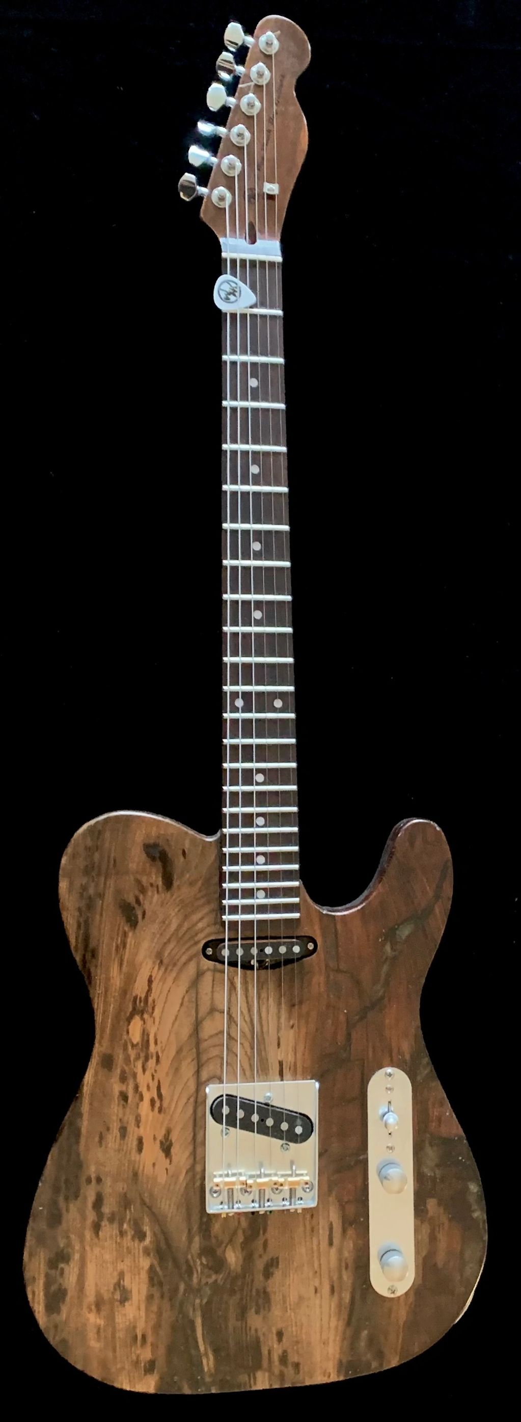 Lovely natural grain with bronzed resin fills.