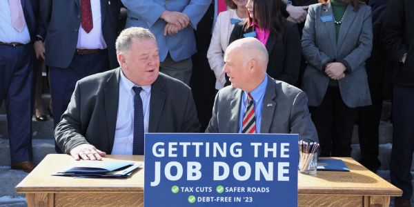 Rep. Llew Jones with Governor Gianforte at a bill signing.