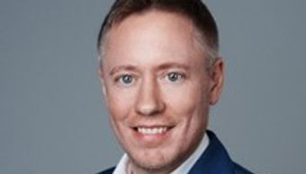 Ken Coyne talks about AI and Blockchain delivery in Poland Technology.