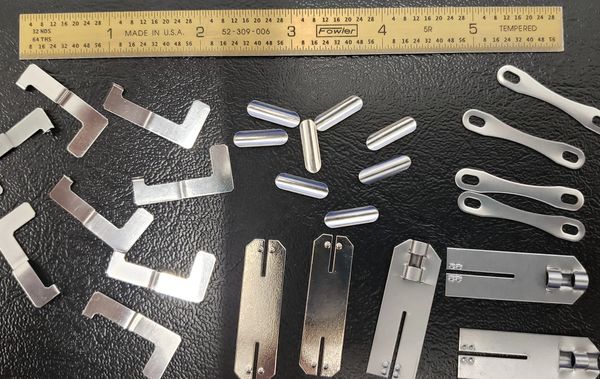 Custom Metal stampings, nickel, steel, connectors. Manufactured via stamping in Minnesota.