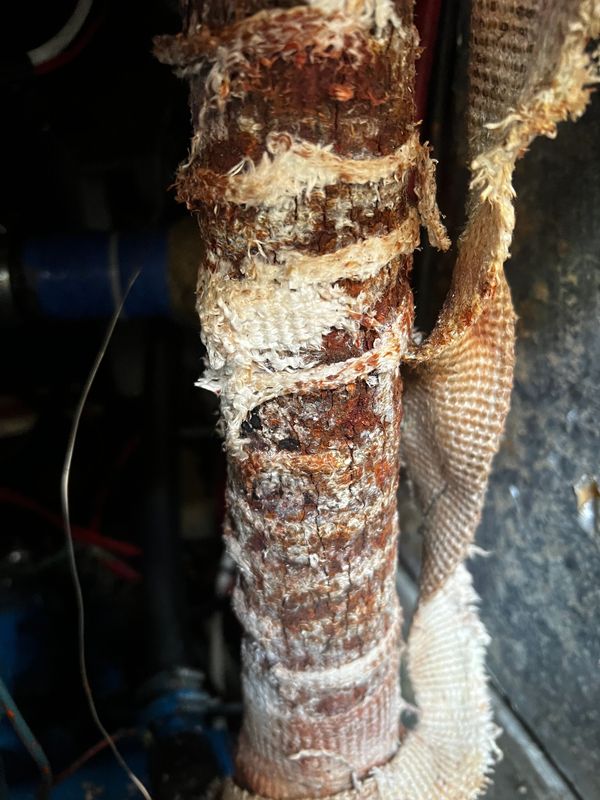 Wet exhaust when unwrapped. "The Tower of Rust"