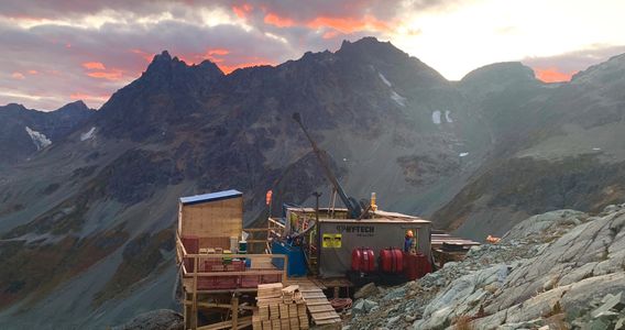 Drilling site with picturesque mountain backdrop
