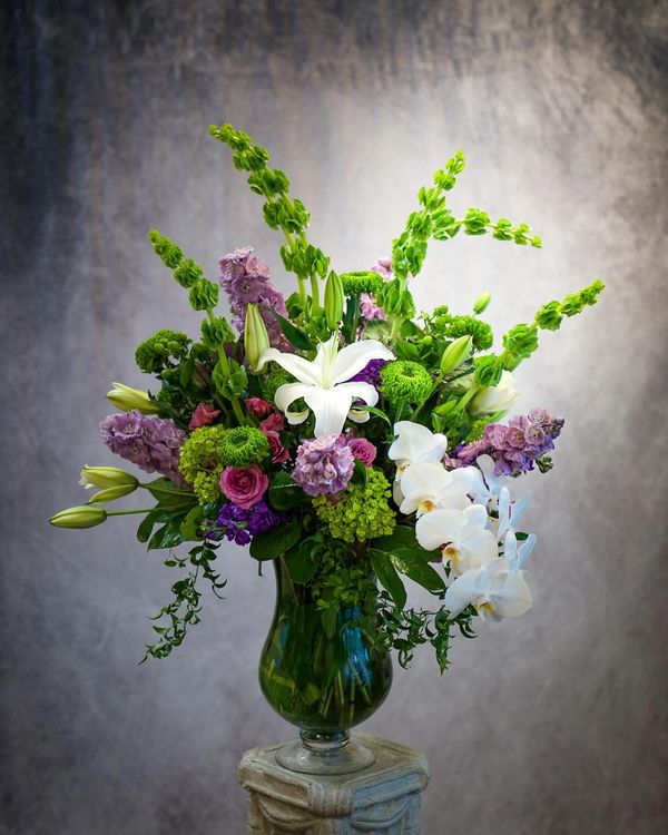 Lilies, bells of Ireland, roses, hydrangeas, roses, and more for flower delivery Wellington FL