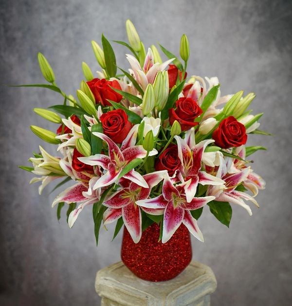 Lilies and roses in a vase 
