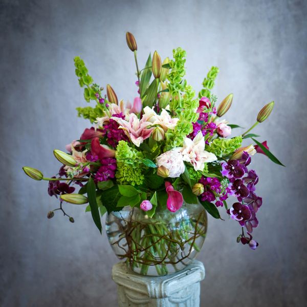 Another magnificent floral arrangement, was designed in a glass bowl.