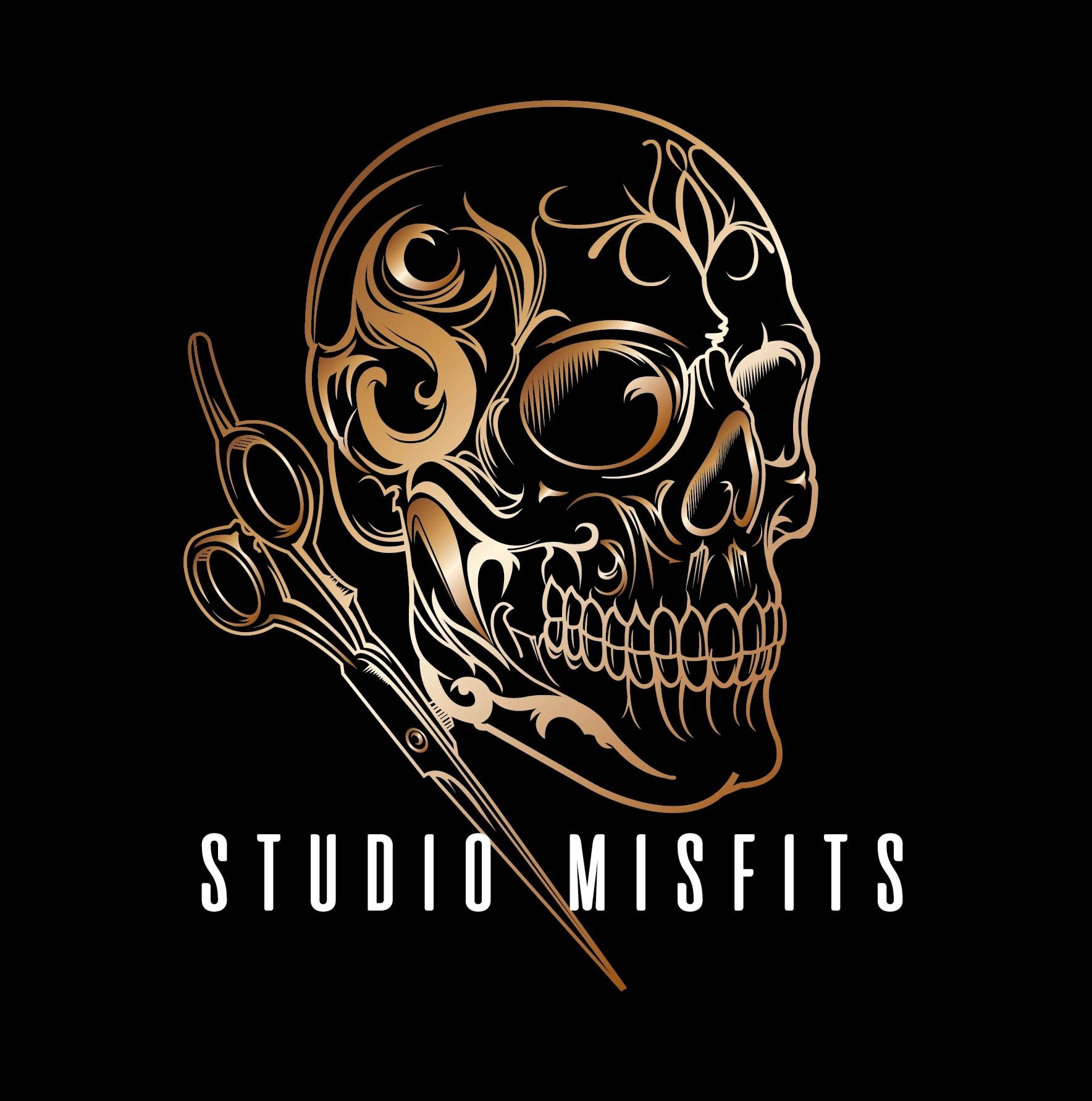 ornate skull in gold next to hairdressing shears, above the words "Studio Misfits".