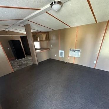 Living room in a 3-bedroom 1 bath unit