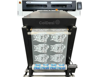 A textile printing machine printing an animal design on fabric.