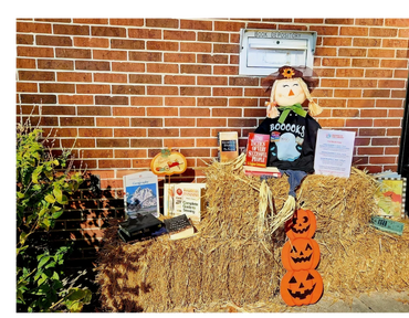 Fall decorations outside of the Carolyn Stewart Public Library.