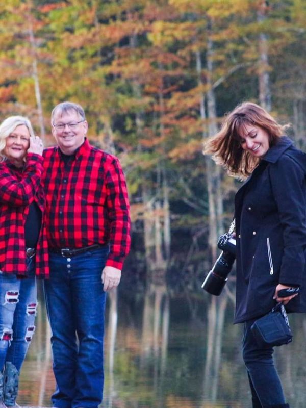 Photographer photographing family