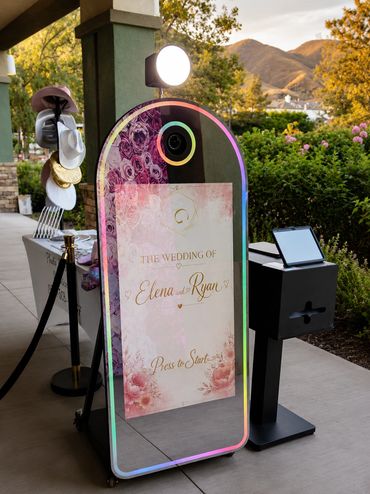 Interactive Mirror Booth rental with touchscreen animations, unlimited prints and digital sharing fo
