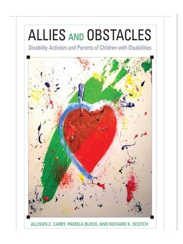 Image of a book with a red abstract heart on a green field with multicolored paint specks.