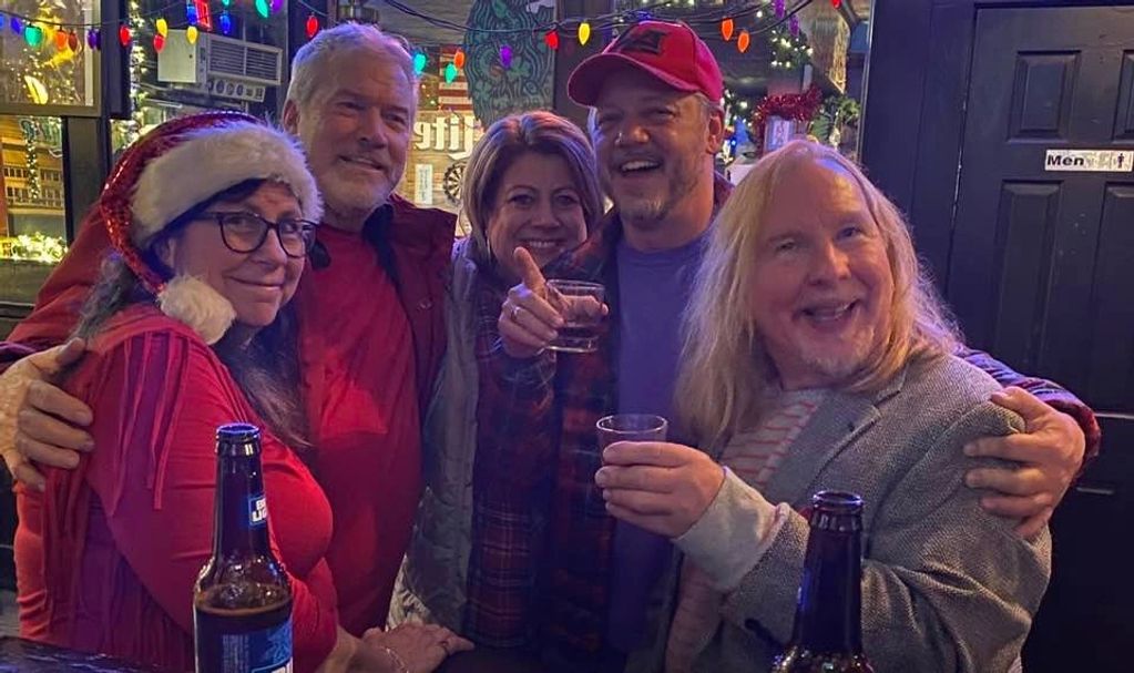 Sydney's parents checking in on us at a Christmas Eve show.