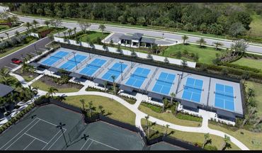Aerial view of pickleball courts at the Caymas Sports Center in Naples, FL