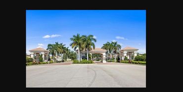 Gated entrance to Coral Lakes, the master-planned community home to Sawgrass at Coral Lakes in Cape