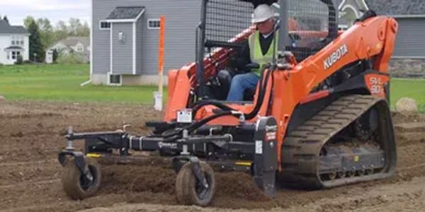 soil preparation dirt using a construction equipment to prep soil for erosion solutions.