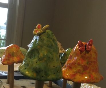 Hand molded ceramic mushrooms